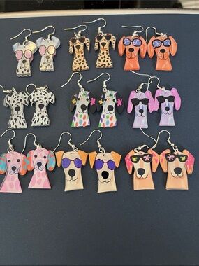 Wow! Set of 9 Doggie earrings. $10